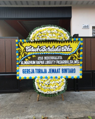 Papan Bunga Duka di Kampung Baru Raya